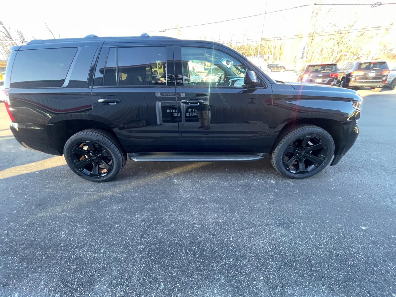 2018 Black /Black Chevrolet Tahoe LT 4WD (1GNSKBKC9JR) with an 5.3L V8 OHV 16V engine, 6A transmission, located at 11115 Chardon Rd. , Chardon, OH, 44024, (440) 214-9705, 41.580246, -81.241943 - This 2016 Chevrolet Tahoe LT 4WD is a full-size SUV that comes equipped with an array of high-end features for safety, comfort, and convenience. It includes blind spot monitoring, rear cross traffic alert, and forward collision warning for enhanced safety. The interior boasts heated leather seats, d - Photo #5